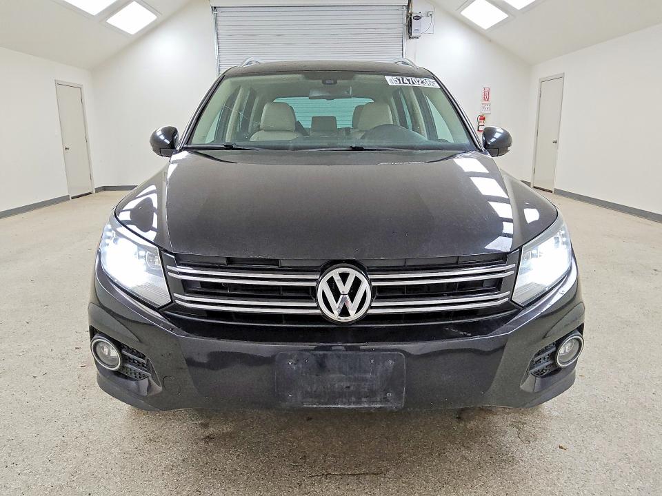 2017 Volkswagen Tiguan VIN WVGVV7AX3HK034490 COPART salvage auction — MINOR DENT/SCRATCHES, Co - Certificate Of Title, sold $1,050 on 2026-07-21 (photo 5)