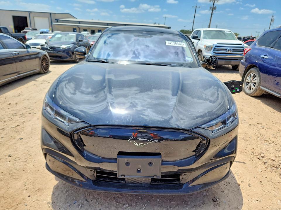 2026 Ford Mustang mach-e VIN 3FMTK3R75TMA01974 COPART salvage auction — SIDE, Tx - Salvage Vehicle Title, sold $11,100 on 2026-08-20 (photo 5)