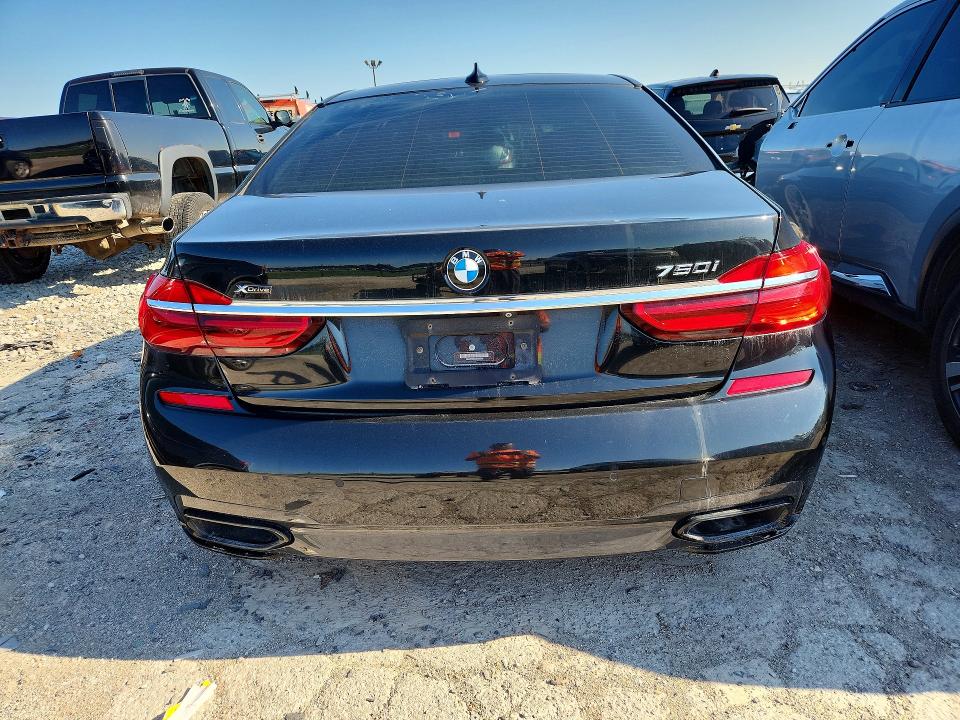 2018 BMW 7er VIN WBA7F2C50JG424686 COPART salvage auction — MINOR DENT/SCRATCHES, Wv - Certificate Of Title (P), sold $9,000 on 2026-07-24 (photo 6)