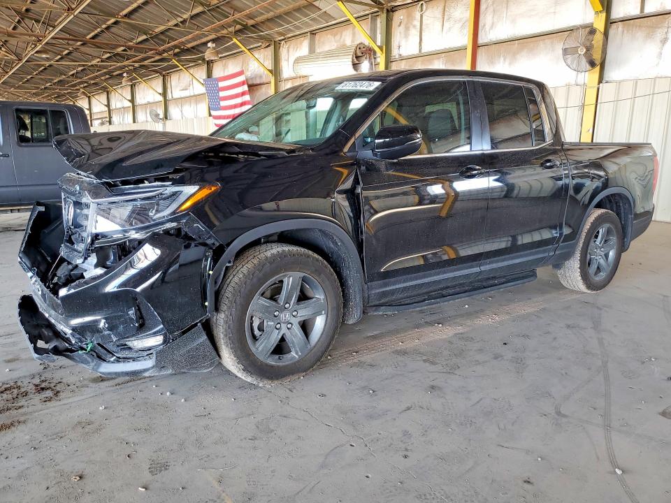 2023 Honda Ridgeline VIN 5FPYK3F5XPB028604 — COPART salvage auction photo