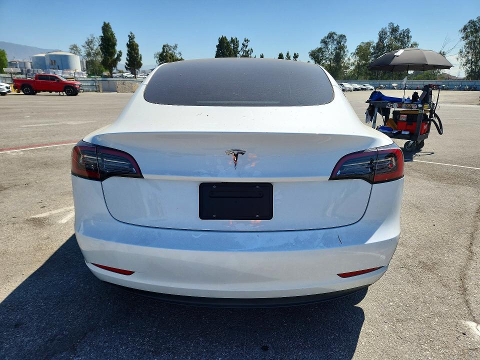 2023 Tesla Model 3 VIN 5YJ3E1EA4PF606046 COPART salvage auction — SIDE, Ca - Salvage Certificate, sold $250 on 2026-07-21 (photo 6)