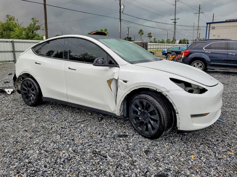 2022 Tesla Model y VIN 7SAYGDEEXNA017150 COPART salvage auction — ALL OVER, FL - CERT OF TITLE SLVG REBUILDABLE, sold $5,500 on 2026-07-24 (photo 4)