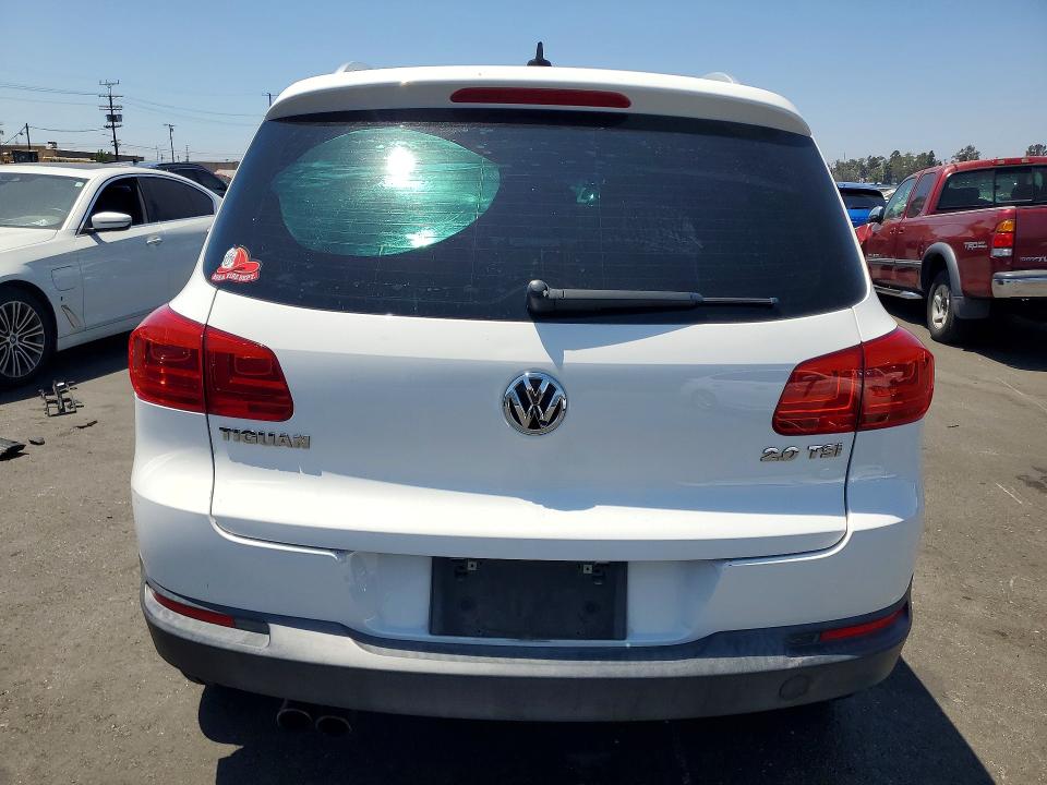 2012 Volkswagen Tiguan VIN WVGAV7AX5CW606224 COPART salvage auction — MINOR DENT/SCRATCHES, Ca - Dis/Dlr/Exp Only Clean Title (P), sold $600 on 2026-07-22 (photo 6)