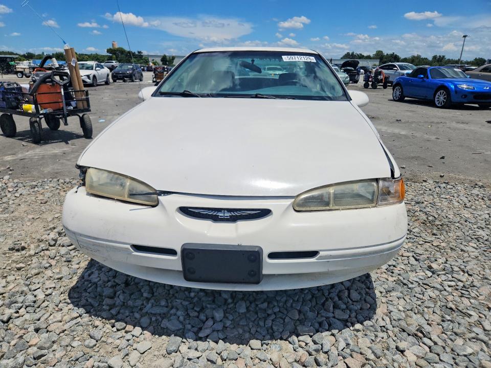 1996 Ford Thunderbird VIN 1FALP62W4TH154400 COPART salvage auction — FRONT END, Fl - Certificate Of Title (P), sold $400 on 2026-07-08 (photo 5)