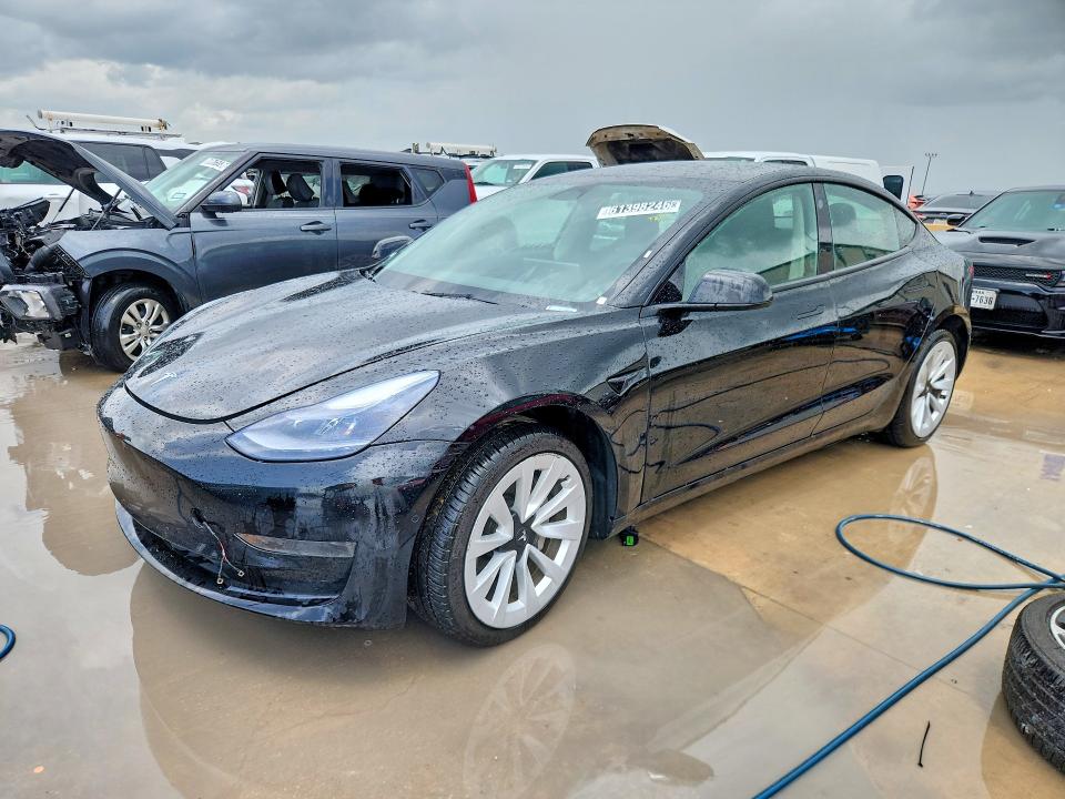 2022 Tesla Model 3 VIN 5YJ3E1EAXNF369303 — COPART salvage auction photo