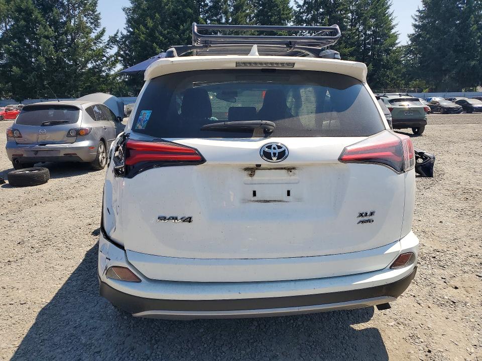 2017 Toyota Rav 4 VIN JTMRFREV8HJ118334 COPART salvage auction — ROLLOVER, Wa - Bill Of Sale, sold $1,950 on 2026-07-17 (photo 6)