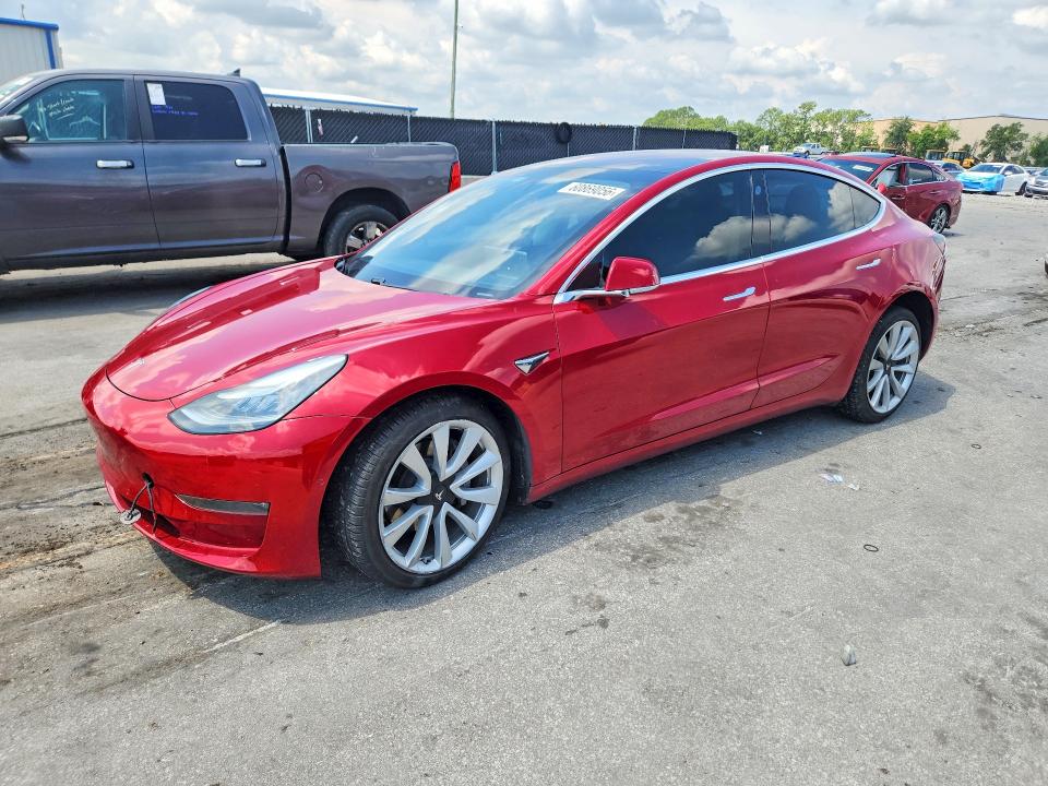 2018 Tesla Model 3 VIN 5YJ3E1EA8JF155016 COPART salvage auction — SIDE, Fl - Cert Of Title Slvg Rebuildable, sold $20 on 2026-07-30 (photo 1)