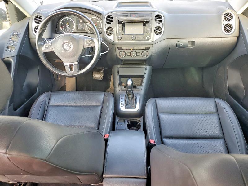 2013 Volkswagen Tiguan VIN WVGBV3AX6DW588847 COPART salvage auction — MINOR DENT/SCRATCHES, Or - Certificate Of Title, sold $1,700 on 2026-08-10 (photo 8)