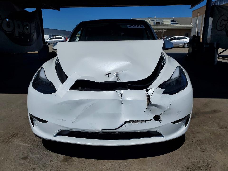 2023 Tesla Model y VIN 7SAYGDEE3PF742918 COPART salvage auction — FRONT END, Ca - Salvage Certificate, sold $15,100 on 2026-07-14 (photo 5)