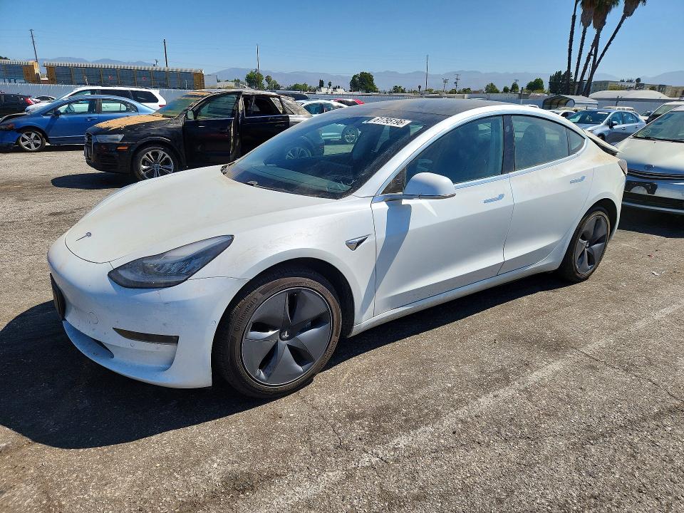 2019 Tesla Model 3 VIN 5YJ3E1EA4KF401402 COPART salvage auction — REAR END, Salvage Title, sold $6,200 on 2026-07-31 (photo 1)