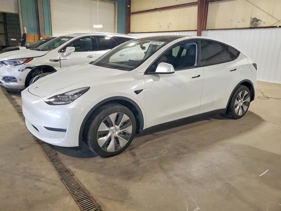 2023 Tesla Model y VIN 7SAYGDEE1PA066305 COPART salvage auction — REAR END, IA - CERT OF TITLE-SALVAGE TITLE, sold $200 on 2026-07-29 (photo 1)