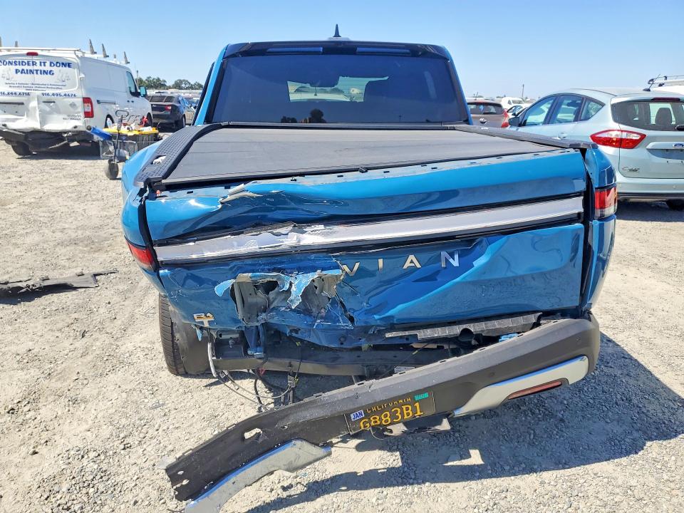 2023 Rivian R1t VIN 7FCTGAAA4PN000693 COPART salvage auction — REAR END, Ca - Salvage Certificate, sold $13,400 on 2026-08-20 (photo 6)