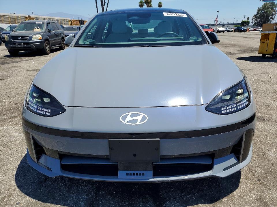 2023 Hyundai Ioniq 6 VIN KMHM54AA8PA045768 COPART salvage auction — DAMAGE HISTORY, CA - CERT OF TITLE-SALVAGED, sold $13,700 on 2026-07-31 (photo 5)