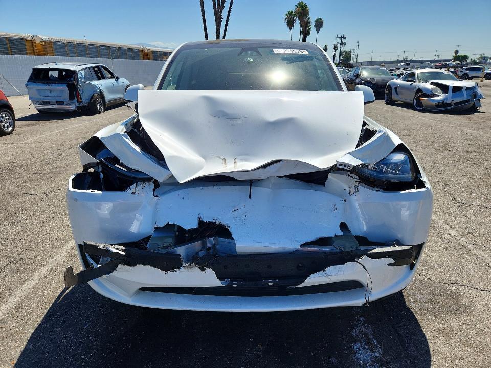2024 Tesla Model y VIN 7SAYGDEE6RF194870 COPART salvage auction — FRONT END, Ca - Salvage Certificate, sold $12,100 on 2026-08-28 (photo 5)