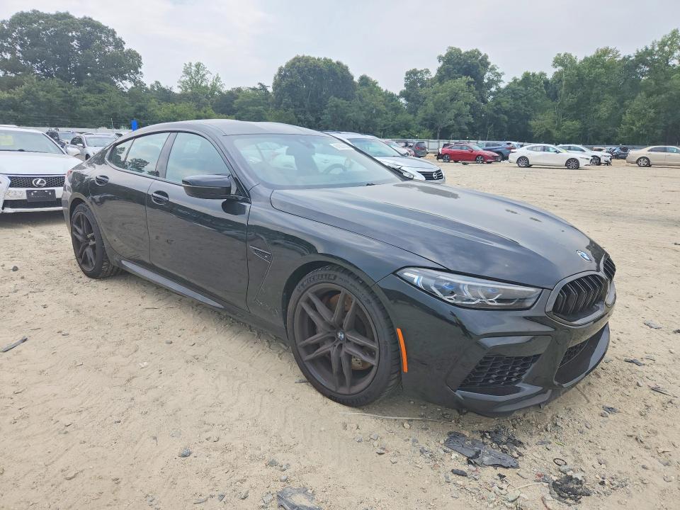 2024 BMW M8 VIN WBSGV0C03RCP95948 COPART salvage auction — WATER/FLOOD, Salvage Title, sold $47,500 on 2026-09-15 (photo 4)