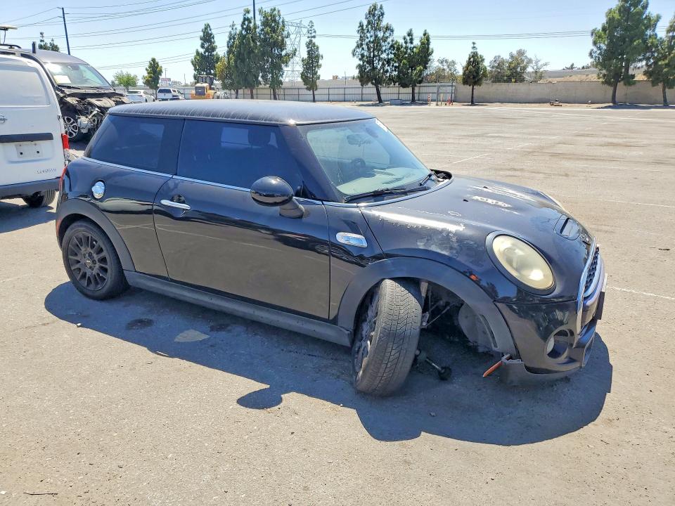 2015 Mini Cooper VIN WMWXP7C57FT740367 COPART salvage auction — UNDERCARRIAGE, Ca - Dis/Dlr/Exp Only Clean Title, sold $500 on 2026-08-04 (photo 4)