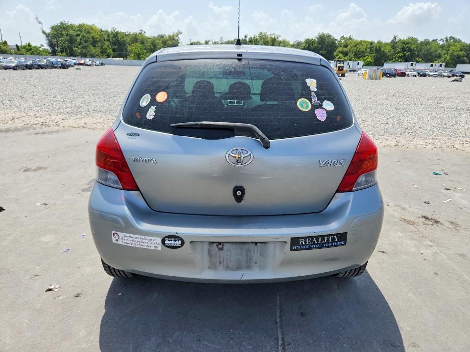 2010 Toyota Yaris VIN JTDJT4K31A5302511 COPART salvage auction — FRONT END, FL - CERT OF TITLE SLVG REBUILDABLE, sold $250 on 2026-07-22 (photo 6)