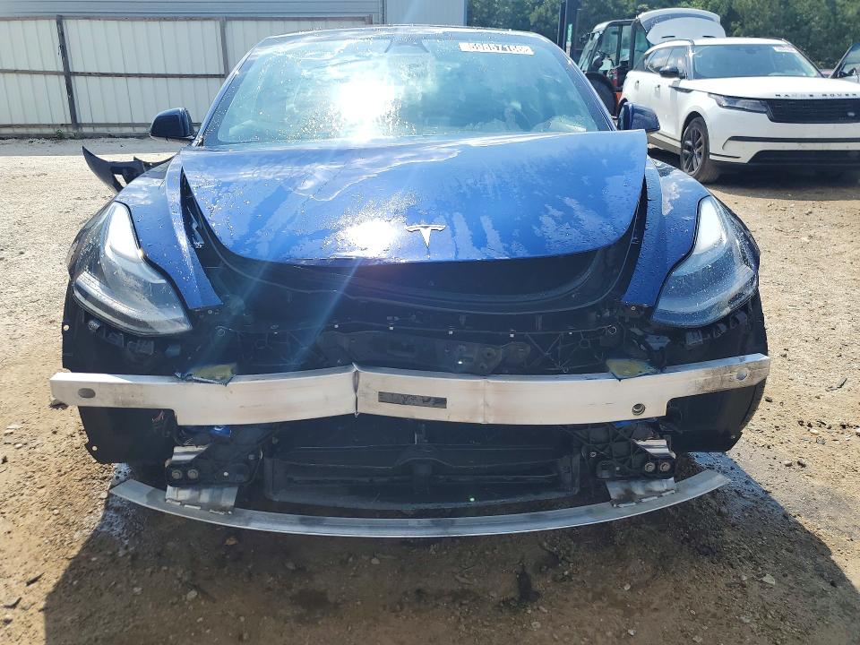 2022 Tesla Model 3 VIN 5YJ3E1EA3NF369885 COPART salvage auction — FRONT END, Fl - Certificate Of Title, sold $7,200 on 2026-07-15 (photo 5)