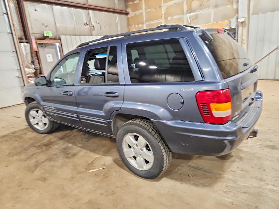 2001 Jeep Grand cherokee VIN 1J4GW58N71C739855 COPART salvage auction — MINOR DENT/SCRATCHES, AK - CERTIFICATE OF VEHICLE TITLE, sold $25 on 2026-07-21 (photo 2)