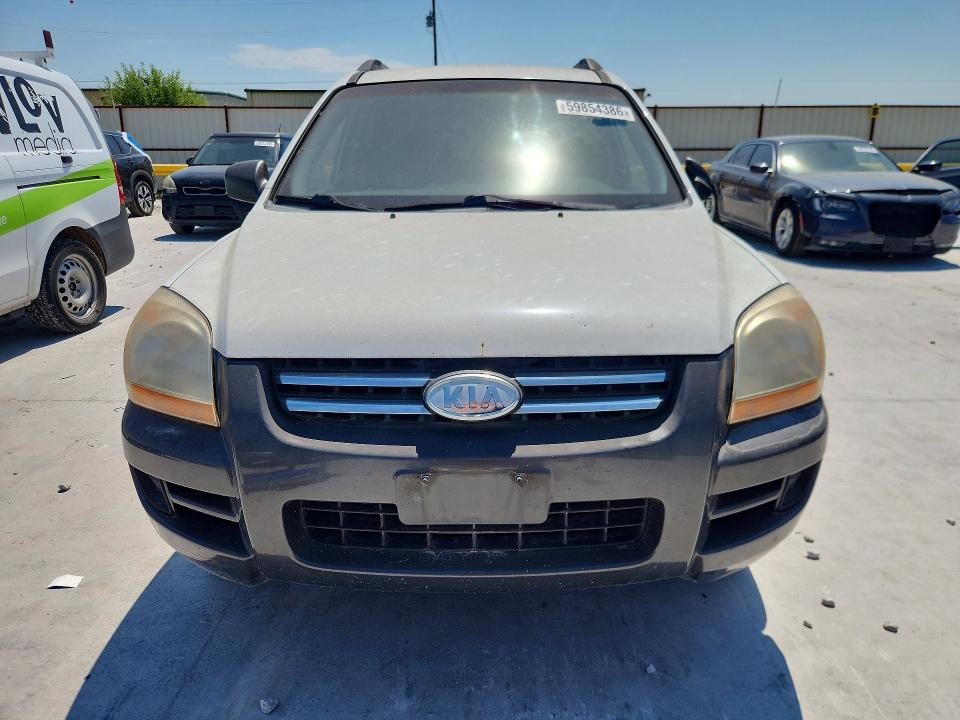 2006 Kia Sportage VIN KNDJF724667198241 COPART salvage auction — MECHANICAL, TX - CERTIFICATE OF TITLE, sold $525 on 2026-07-24 (photo 5)