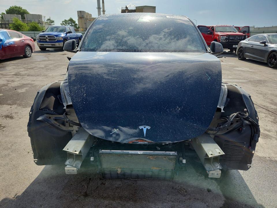 2021 Tesla Model y VIN 5YJYGAEE7MF180688 COPART salvage auction — FRONT END, Ok - Cert Of Title-Salvage, sold $10,500 on 2026-08-28 (photo 5)
