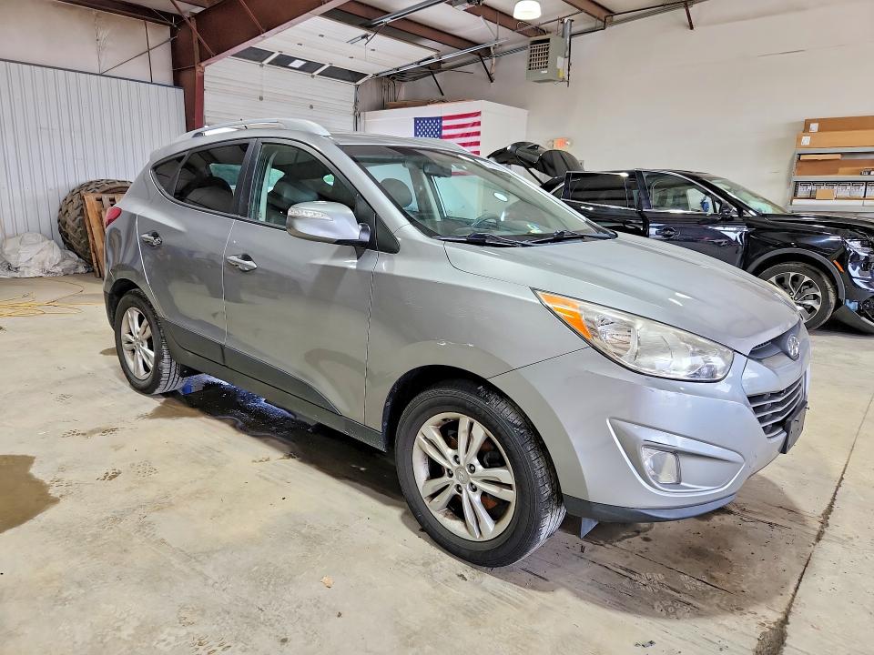 2013 Hyundai Tucson VIN KM8JU3AC0DU759566 COPART salvage auction — MINOR DENT/SCRATCHES, Md - Certificate Of Title, sold $850 on 2026-07-24 (photo 4)