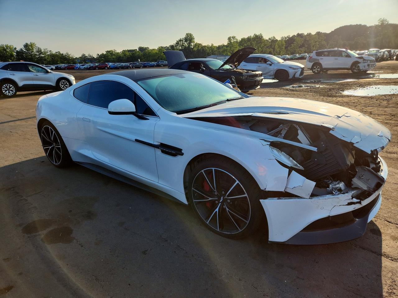 2014 Aston Martin V12 Vanquish VIN SCFLDCFP2EGJ00902 COPART salvage auction — Front End, St - Salvage Title, sold $31,750 on 2026-09-25 (photo 4)