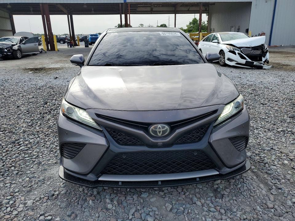 2018 Toyota Camry VIN 4T1B61HK6JU080803 COPART salvage auction — SIDE, Fl - Cert Of Title Slvg Rebuildable, sold $9,700 on 2026-07-31 (photo 5)