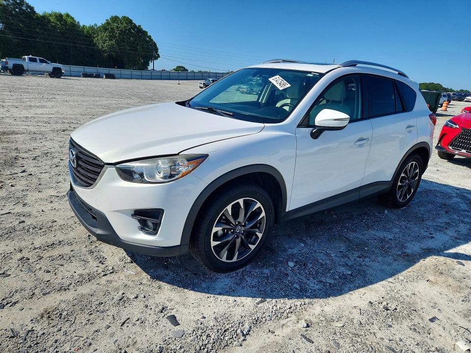 2016 Mazda Cx-5 VIN JM3KE2DY4G0789647 COPART salvage auction — MINOR DENT/SCRATCHES, Ga - Certificate Of Title, sold $2,300 on 2026-07-22 (photo 1)