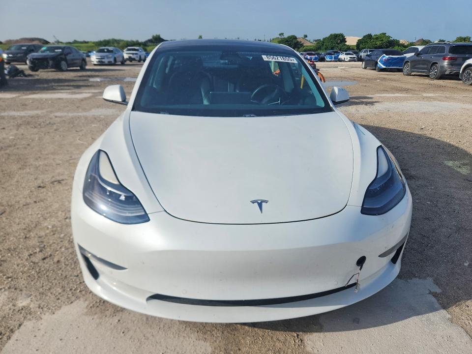 2021 Tesla Model 3 VIN 5YJ3E1EBXMF915038 COPART salvage auction — REAR END, Fl - Cert Of Title Slvg Rebuildable, sold $6,200 on 2026-07-28 (photo 5)