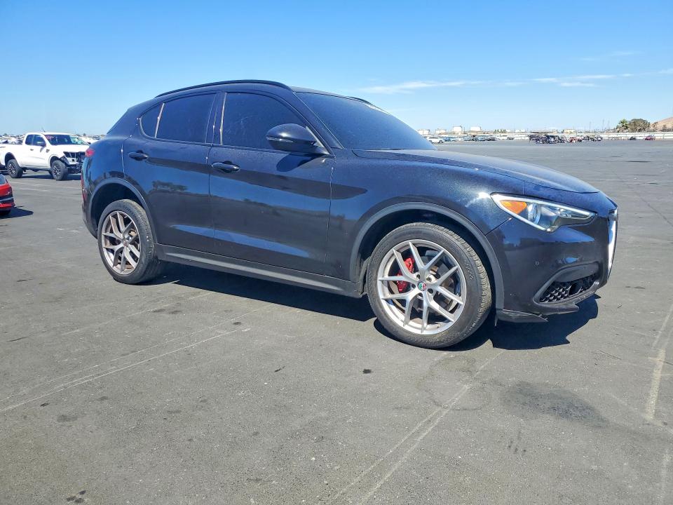 2018 Alfa romeo Stelvio VIN ZASFAKNN2J7B73316 COPART salvage auction — SIDE, Ca - Salvage Certificate, sold $4,300 on 2026-09-02 (photo 4)