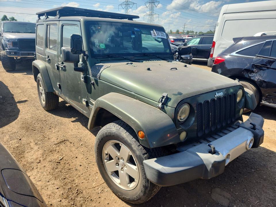 2008 Jeep Wrangler unlimited VIN 1J4GA59198L520500 COPART salvage auction — NORMAL WEAR, IN - CERTIFICATE OF TITLE, sold $2,472 on 2026-07-09 (photo 4)