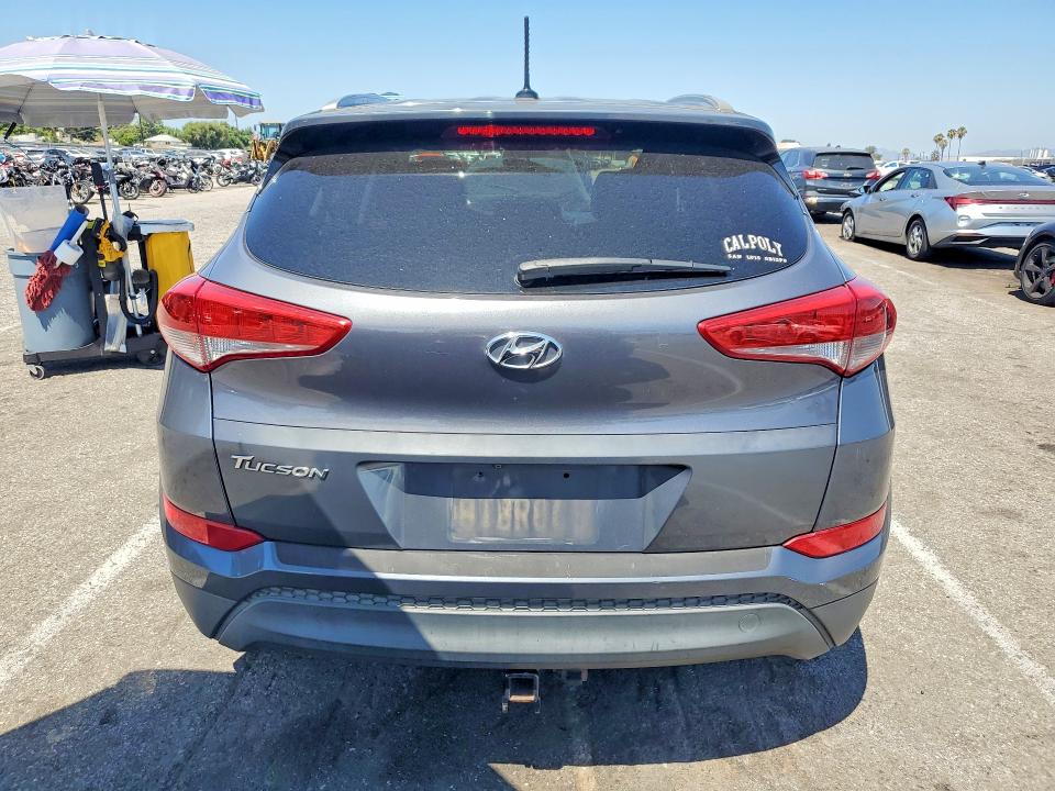 2016 Hyundai Tucson VIN KM8J33A42GU182913 COPART salvage auction — NORMAL WEAR, Ca - Dis/Dlr/Exp Only Clean Title (P), sold $1,700 on 2026-07-31 (photo 6)