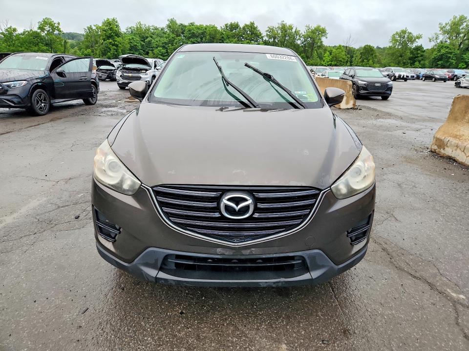 2016 Mazda Cx-5 VIN JM3KE4BY4G0604494 COPART salvage auction — MECHANICAL, Ny - Certificate Of Title, sold $2,400 on 2026-07-13 (photo 5)