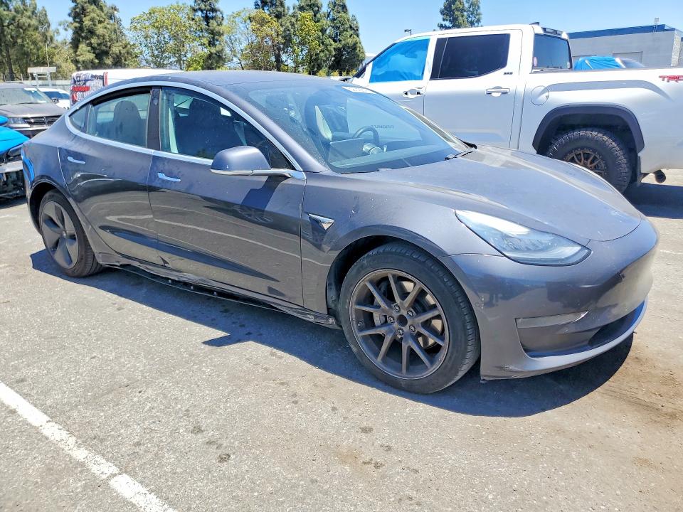 2018 Tesla Model 3 VIN 5YJ3E1EAXJF059176 COPART salvage auction — MINOR DENT/SCRATCHES, Ca - Salvage Certificate, sold $5,800 on 2026-07-16 (photo 4)