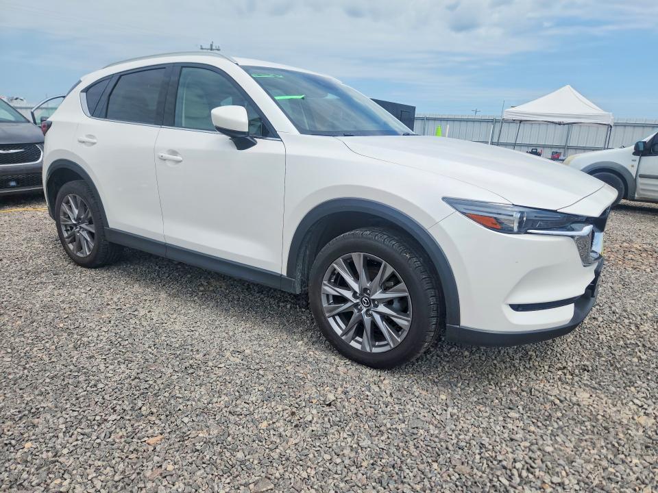 2021 Mazda Cx-5 VIN JM3KFBDM7M1442510 COPART salvage auction — WATER/FLOOD, Mo - Salvage Certificate Of Title, sold $100 on 2026-07-29 (photo 4)