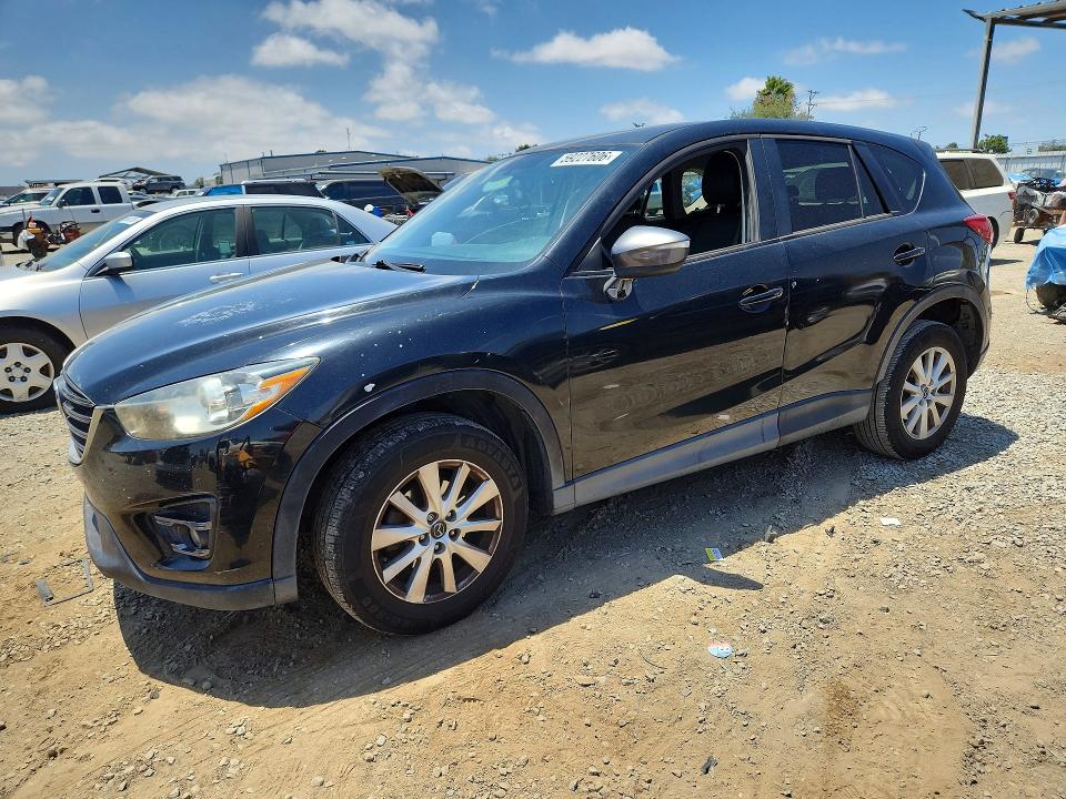 2016 Mazda VIN JM3KE4CY0G0830577 COPART salvage auction — SIDE, Ca - Dis/Dlr/Exp Clean W/Salv Hist, sold $2,350 on 2026-07-07 (photo 1)