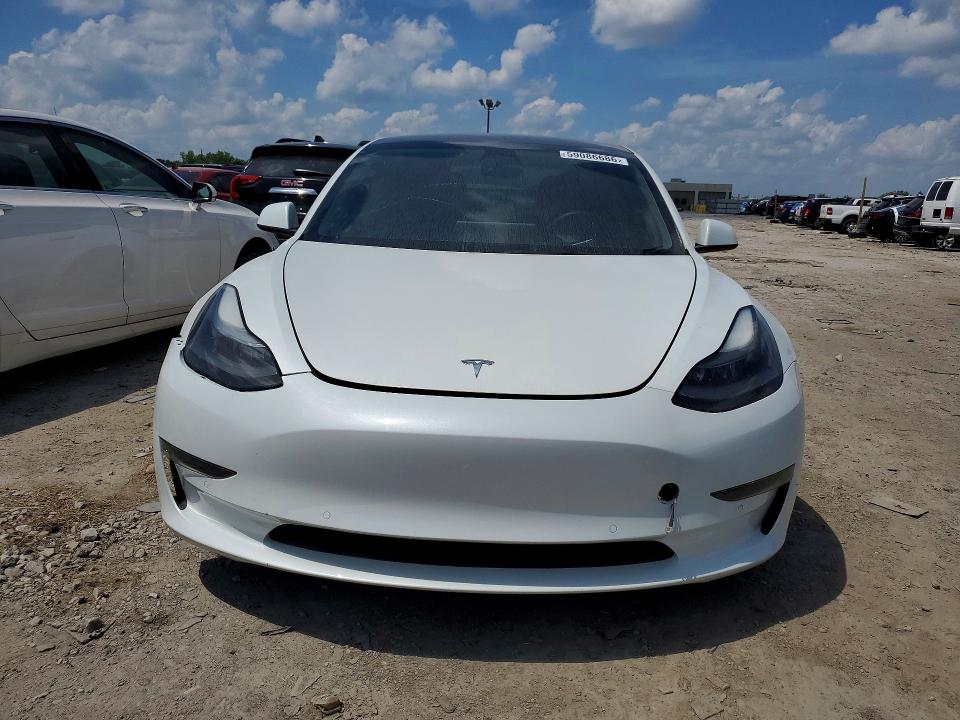 2022 Tesla Model 3 VIN 5YJ3E1EA5NF111979 COPART salvage auction — MINOR DENT/SCRATCHES, Oh - Dealer Only Clean Title (P), sold $11,600 on 2026-07-31 (photo 5)