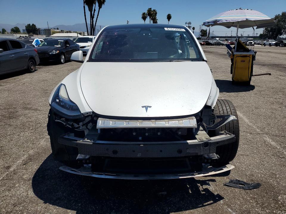 2022 Tesla Model y VIN 7SAYGAEE9NF465526 COPART salvage auction — SIDE, Ca - Salvage Certificate, sold $8,200 on 2026-08-28 (photo 5)