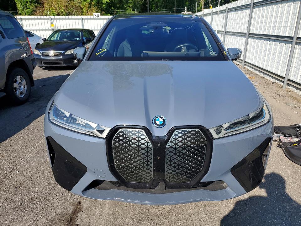 2024 BMW Ix VIN WB523CF02RCP02238 COPART salvage auction — REAR END, Fl - Cert Of Title Slvg Rebuildable, sold $23,700 on 2026-07-28 (photo 5)