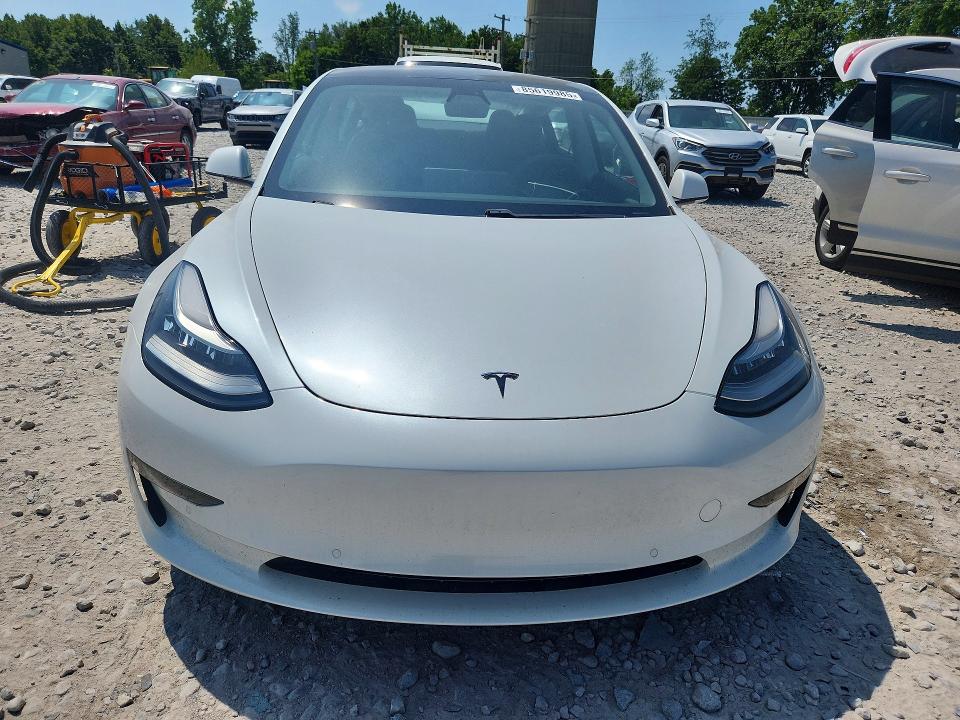 2020 Tesla VIN 5YJ3E1EBXLF735332 COPART salvage auction — SIDE, Mi - Certificate Of Title, sold $10,800 on 2026-07-30 (photo 5)