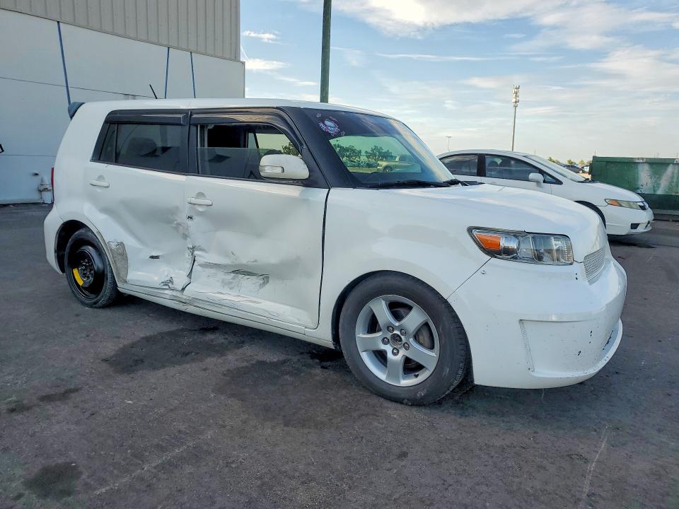 2011 Toyota Scion VIN JTLZE4FE7B1120060 COPART salvage auction — SIDE, Fl - Cert Of Title Slvg Rebuildable, sold $425 on 2026-07-25 (photo 4)