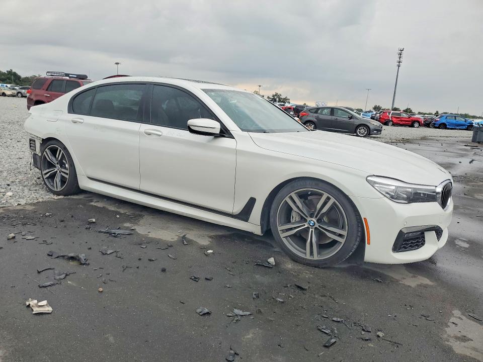 2019 BMW 7er VIN WBA7E2C55KB218281 COPART salvage auction — REAR END, Fl - Cert Of Title Slvg Rebuildable, sold $12,500 on 2026-08-03 (photo 4)