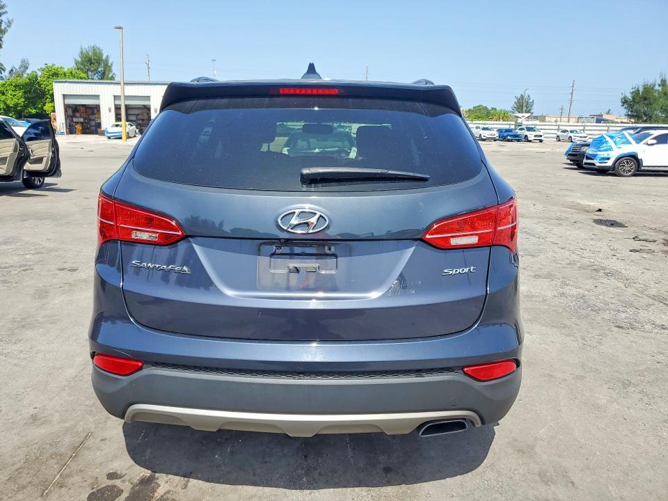 2014 Hyundai Santa fe VIN 5XYZU3LB4EG195645 COPART salvage auction — MINOR DENT/SCRATCHES, Fl - Certificate Of Title, sold $1,800 on 2026-07-15 (photo 6)