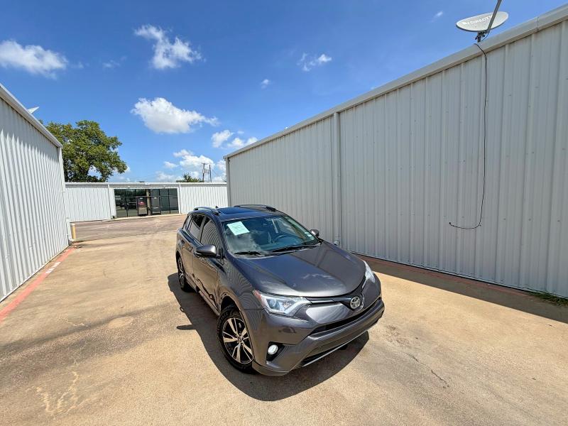 2017 Toyota Rav4 VIN JTMWFREV8HJ711890 COPART salvage auction — MINOR DENT/SCRATCHES, TX - CERTIFICATE OF TITLE (P), sold $29,500 on 2026-07-25 (photo 1)