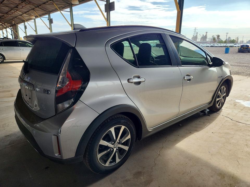 2018 Toyota Prius c VIN JTDKDTB34J1614566 COPART salvage auction — REAR END, AZ - CERT OF TITLE - SALVAGE, sold $2,650 on 2026-07-27 (photo 3)