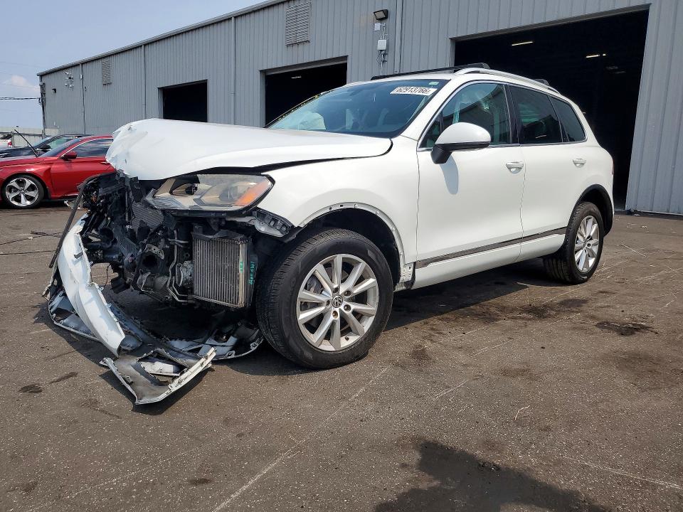 2014 Volkswagen Touareg VIN WVGEP9BP0ED007915 COPART salvage auction — FRONT END, Fl - Cert Of Title Slvg Rebuildable, sold $875 on 2026-08-17 (photo 1)