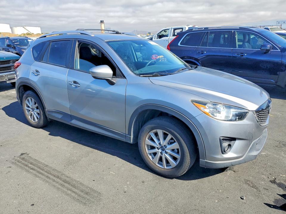 2013 Mazda Cx-5 VIN JM3KE4CE1D0157056 COPART salvage auction — SIDE, CA - SALVAGE CERTIFICATE, sold $60 on 2026-07-27 (photo 4)