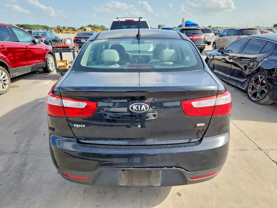 2015 Kia Rio VIN KNADM4A39F6527091 COPART salvage auction — NORMAL WEAR, Tx - Certificate Of Title, sold $975 on 2026-07-30 (photo 6)