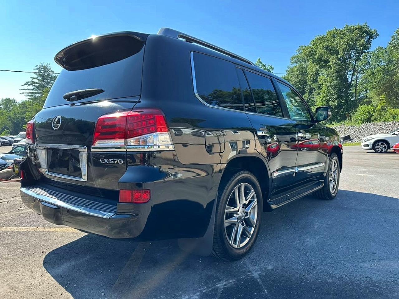 2015 Lexus Lx VIN JTJHY7AX1F4166719 COPART salvage auction — Minor Dent/Scratches, MA - CERTIFICATE OF TITLE, sold $23,200 on 2026-08-12 (photo 3)